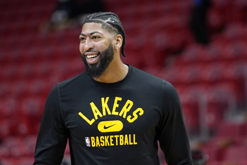 Los Angeles Lakers forward Anthony Davis warms up before an NBA basketball game.