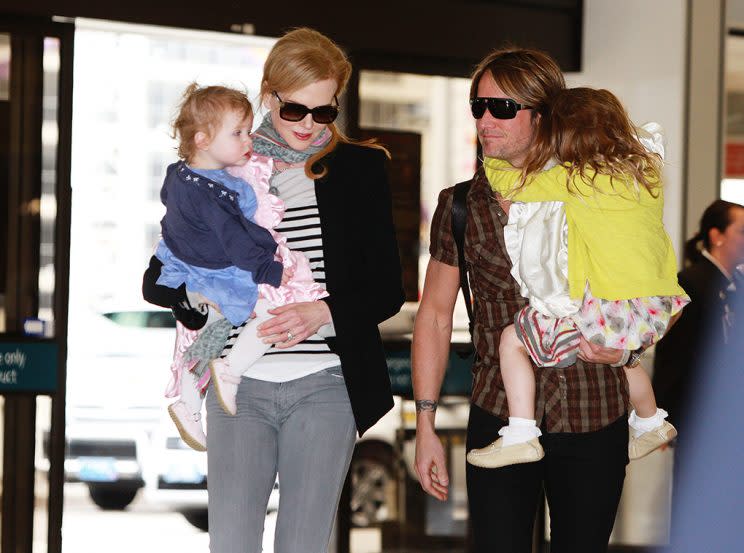 Editorial Use Only. Consent Required for Commercial Use and Book Publications Mandatory Credit: Photo by Craig Greenhill/Newspix/REX/Shutterstock (1757622a) Nicole Kidman with daughter Faith Urban and Keith Urban with Sunday Rose Urban Nicole Kidman and Keith Urban and children at Sydney International Airport, Sydney, Australia - 22 Jun 2012