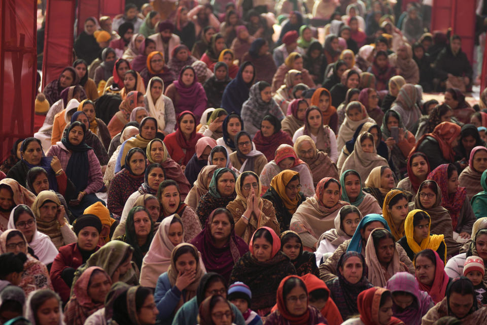 FILE - Sikh devotees gather to pay obeisance at a temple on the birth anniversary of Guru Gobind Singh, the tenth Sikh Guru in Jammu, India, Thursday, Jan.5, 2023. The nones in India come from an array of belief backgrounds, including Hindu, Muslim and Sikh. The surge of Hindu nationalism has shrunk the space for the nones over the last decade, activists say. (AP Photo/Channi Anand, File)