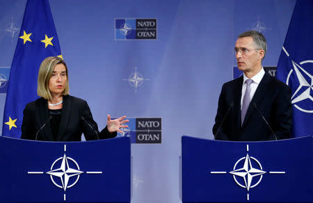 European Union foreign policy chief Federica Mogherini and NATO Secretary-General Jens Stoltenberg address a joint news conference during a NATO foreign ministers meeting at the Alliance headquarters in Brussels, Belgium, December 6, 2016. REUTERS/Francois Lenoir