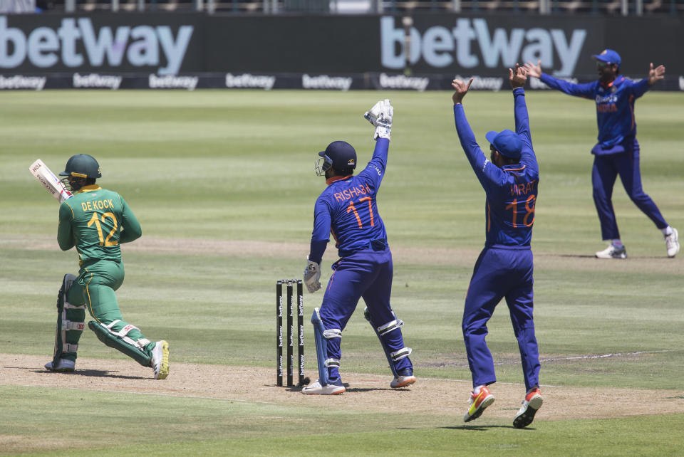 India appeal a wicket against South African batsman Quinton De Kock during the third ODI match between South Africa and India at Newlands, Cape Town, South Africa, Sunday, Jan. 23, 2022. (AP Photo/Halden Krog)