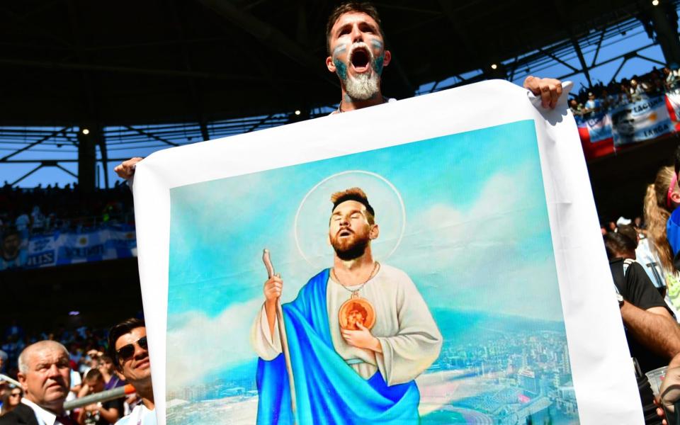 Lionel Messi is seen as the Messiah by Argentina fans - AFP