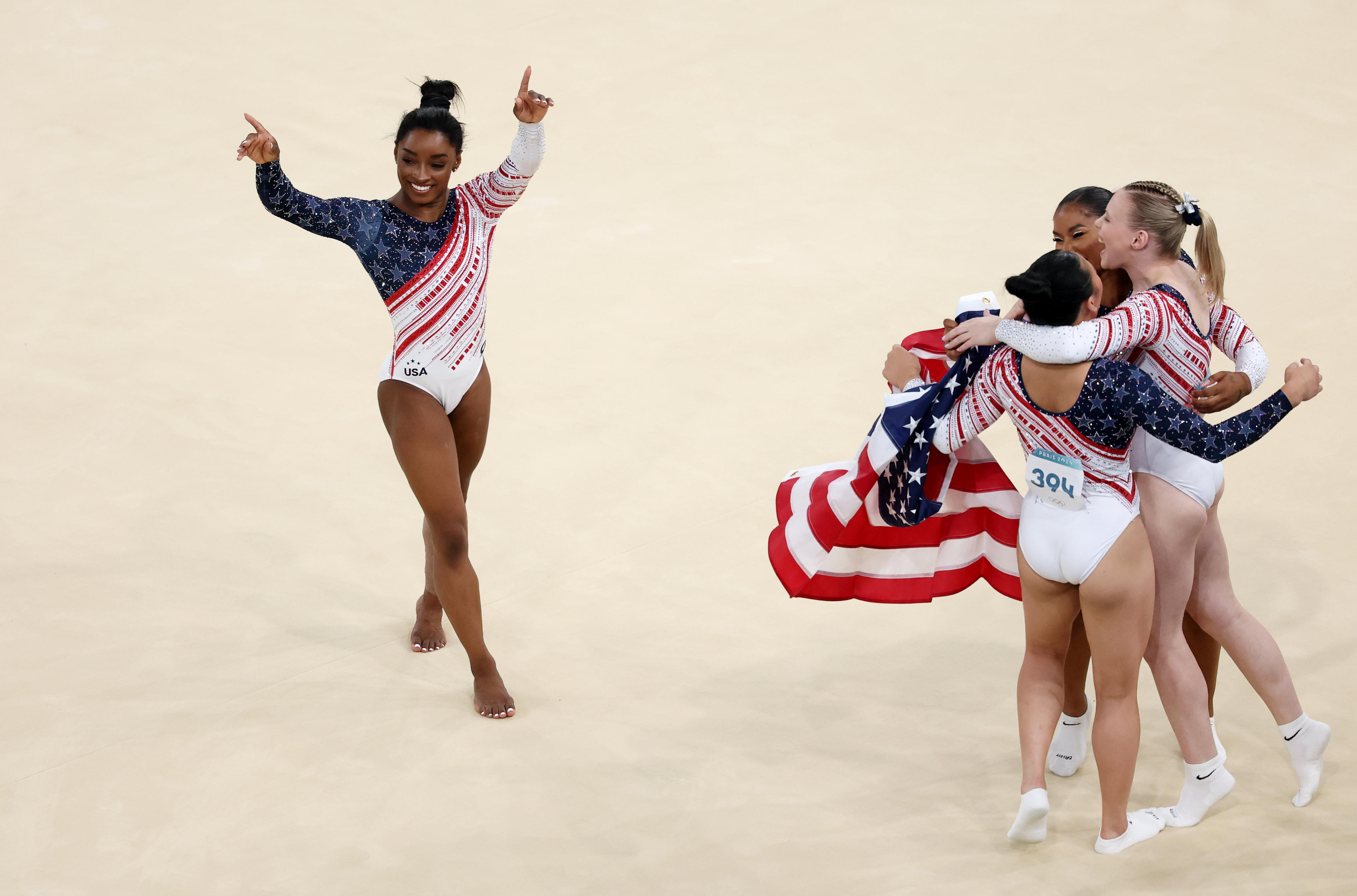 Simone Biles, Sunisa Lee, Jade Carey and Jordan Chiles of Team USA celebrate after winning the gold medal. (Patrick Smith/Getty Images)