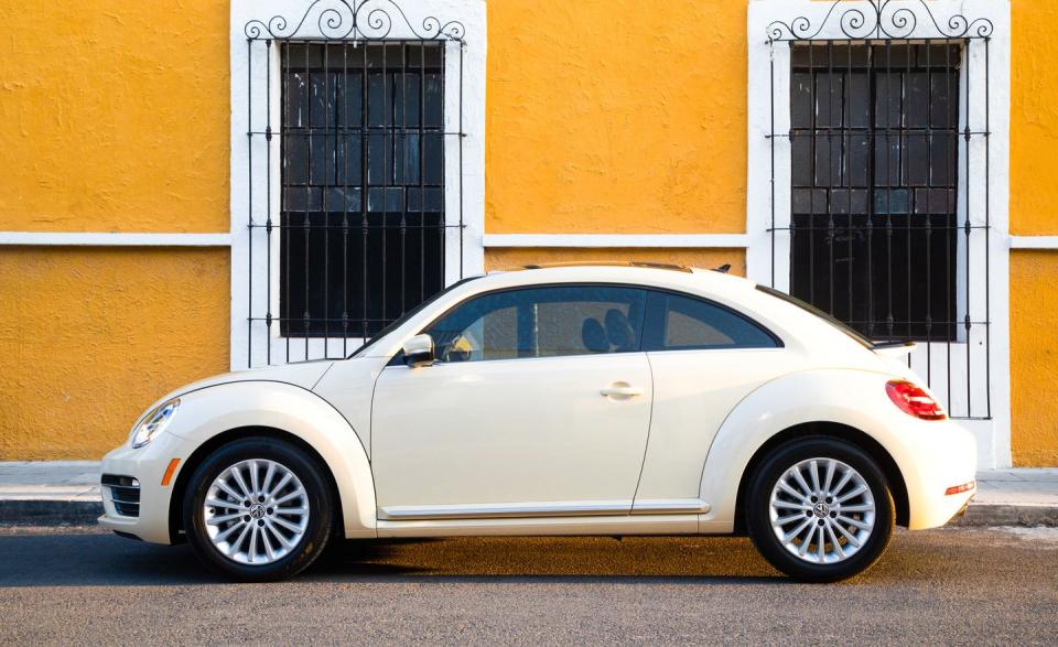 <p>The <a rel="nofollow noopener" href="https://www.caranddriver.com/volkswagen/beetle" target="_blank" data-ylk="slk:distinctive Volkswagen Beetle;elm:context_link;itc:0;sec:content-canvas" class="link ">distinctive Volkswagen Beetle</a>, offered as a coupe or a convertible, is the rare car that is nearly as fun to drive as it is to look at. A 170-hp turbocharged four-cylinder engine is standard, and customers can choose between a five-speed manual transmission and a six-speed automatic. The Beetle Dune gets the automatic standard, as well as an extra 0.2 inch of ground clearance and SUV-like body cladding. If road-burning is more your thing, the 210-hp turbocharged R-Line brings a sportier vibe. Get any of the Bugs while you can, however: For the second time in its history, the Volkswagen Beetle <a rel="nofollow noopener" href="https://www.caranddriver.com/news/vw-beetle-final-edition-2019-coupe-convertible" target="_blank" data-ylk="slk:will fade from the U.S. market;elm:context_link;itc:0;sec:content-canvas" class="link ">will fade from the U.S. market</a>. The Beetle will be sold through the end of 2019, with no 2020 model year planned. A replacement could take the form of a full-electric, but details on that are forthcoming.</p>
