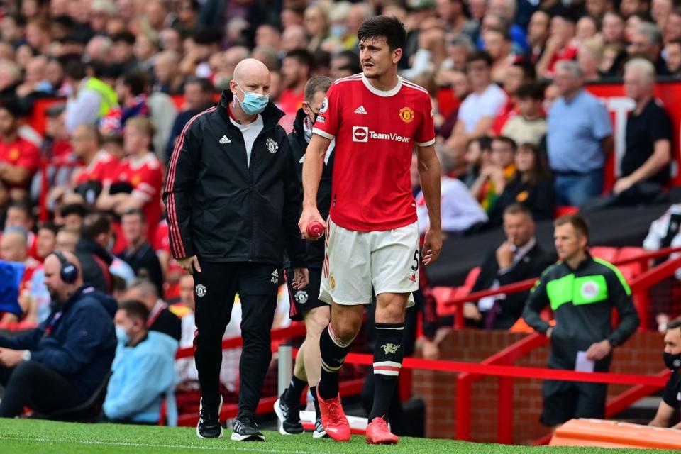 Harry Maguire appeared to suffer a calf injury   (AFP via Getty Images)
