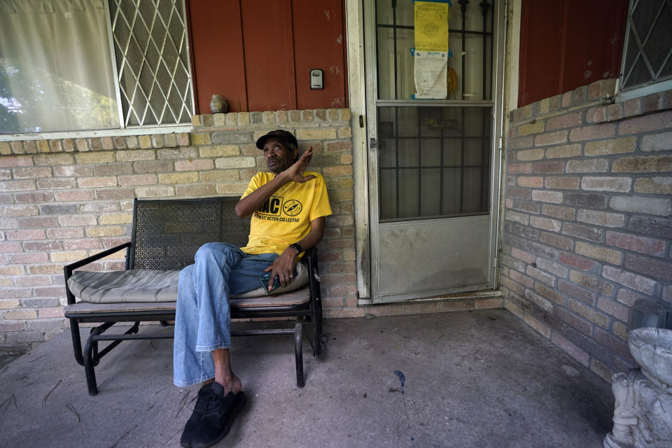 Mal Moses talks about the damage done to his home by Hurricane Harvey in 2017 and the difficulties he faced to get repairs, Thursday, Aug. 25, 2022, in Houston. A local nonprofit, West Street Recovery, ultimately helped repair his home. (AP Photo/David J. Phillip)