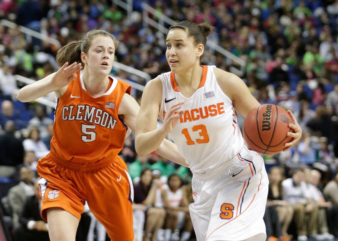 Clemson’s Kelly Gramlich (5) defends Syracuse’s Brianna Butler (13) during a 2014 game.