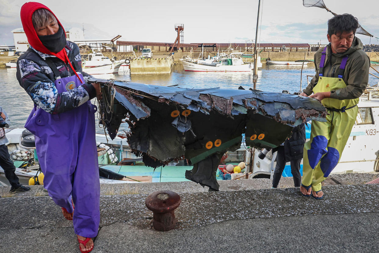 Debris from a US Osprey aircraft (Nanako Suto / Yomiuri Shimbun via AP)