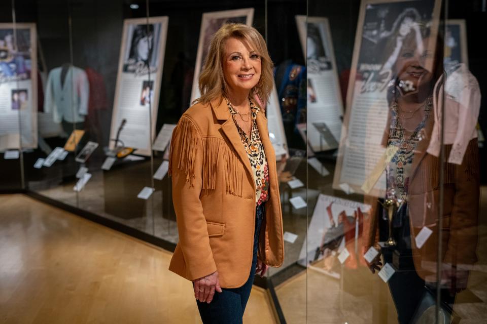 Patty Loveless poses for a portrait in her new exhibit at the Country Music Hall of Fame in Nashville, Tenn., Tuesday, Aug. 22, 2023.