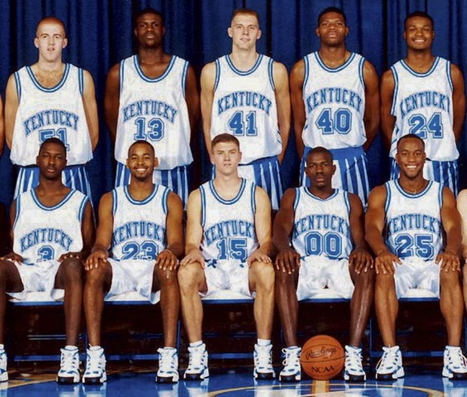 Mark Pope (41) and Jeff Sheppard (15) played together on Kentucky’s 1996 national championship team. Surrounding Pope and Sheppard are teammates Oliver Simmons (51), Nazr Mohammed (13), Walter McCarty (40), Antoine Walker (24), Allen Edwards (3), Derek Anderson (23), Tony Delk (00) and Anthony Epps (25).
