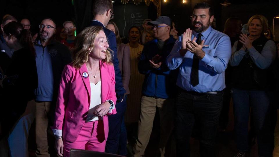 Boise Mayor Lauren McLean is applauded by supporters, including City Council candidate Jordan Morales, right, after arriving to the Election Night party at Lounge at the End of the Universe in Boise. Darin Oswald/doswald@idahostatesman.com