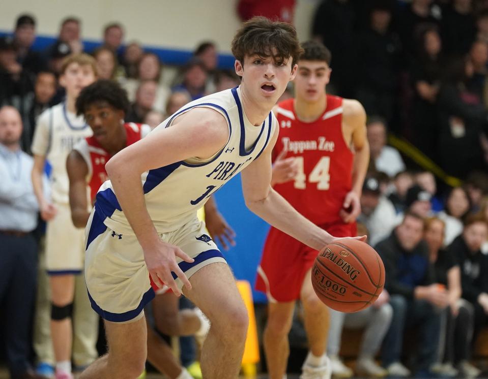 Pearl River's Sean O'Brien (14) works the ball during their 52-35 win over Tappan Zee in the Section 1, Class A quarterfinal basketball game at Pearl River High School on Wednesday, Feb. 21, 2024.