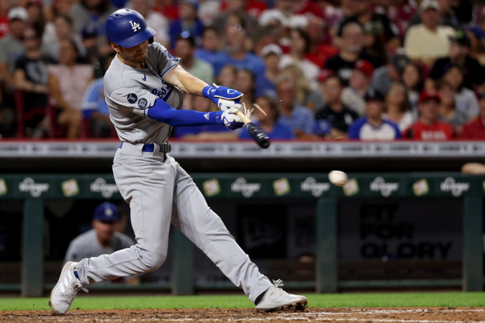 Trea Turner breaks his bat on a sixth-inning single. The Dodgers were limited to six hits.