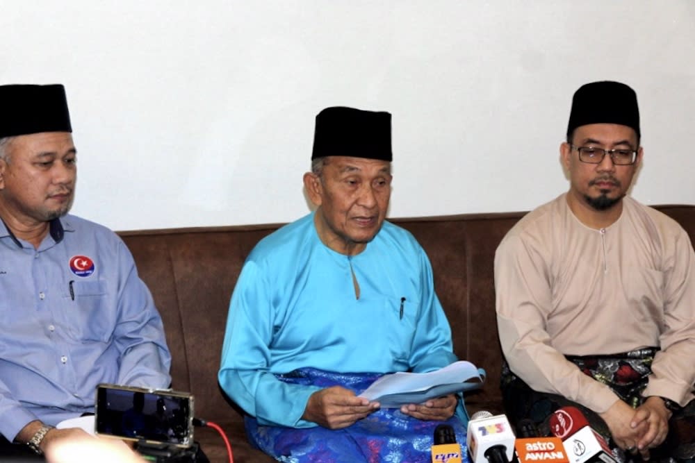 Johor Islamic Affairs, Agriculture and Rural Development Committee chairman Tosrin Jarvanthi (centre) said the raid was ‘conducted according to SOP and there was no brutality involved’. — Picture by Ben Tan