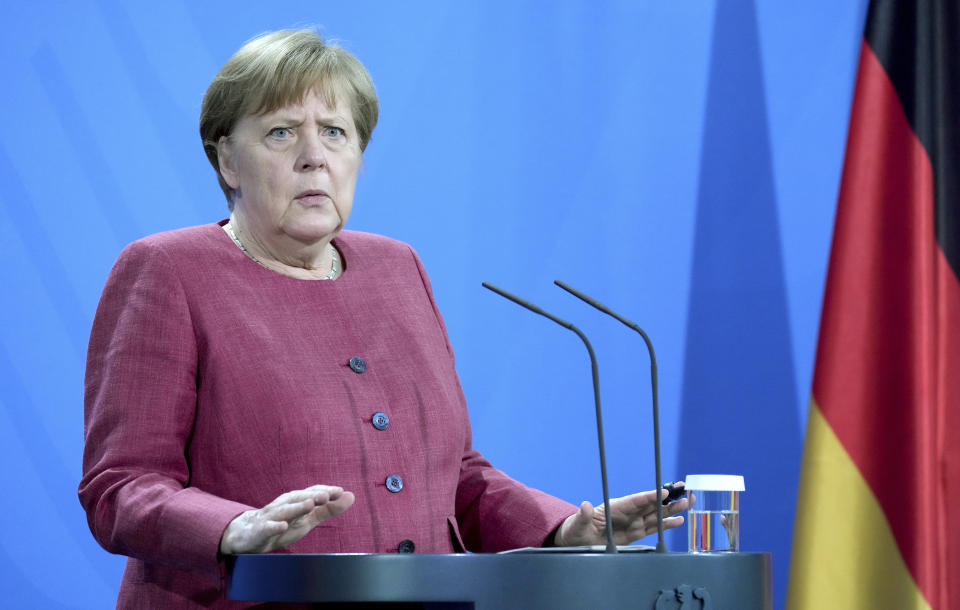 German Chancellor Angela Merkel addresses the media during press conference at the Chancellery in Berlin, Germany, Friday, May 21, 2021 following the virtual 'Global Health Summit'. (AP Photo/Michael Sohn, pool)