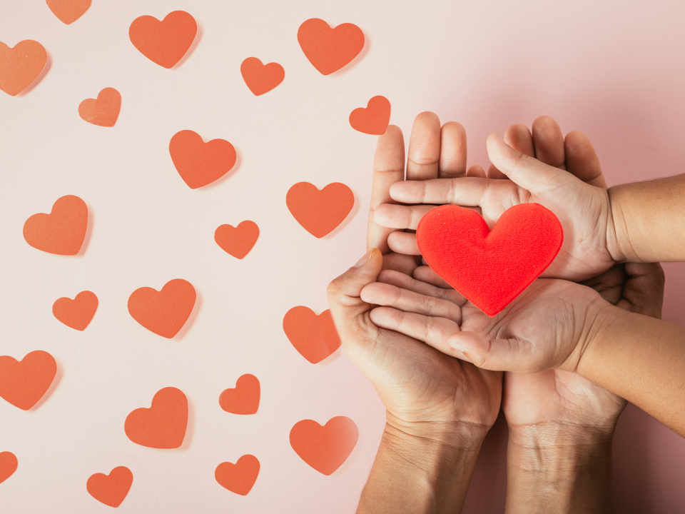 A mother and daughter celebrate their first Valentine's Day as a family of two. (Image via Canva)