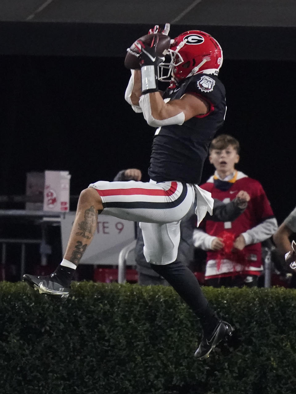 Georgia wide receiver Jermaine Burton makes a touchdown reception against Mississippi State during the first half of an NCAA college football game Saturday, Nov. 21, 2020, in Athens, Ga. (AP Photo/Brynn Anderson)