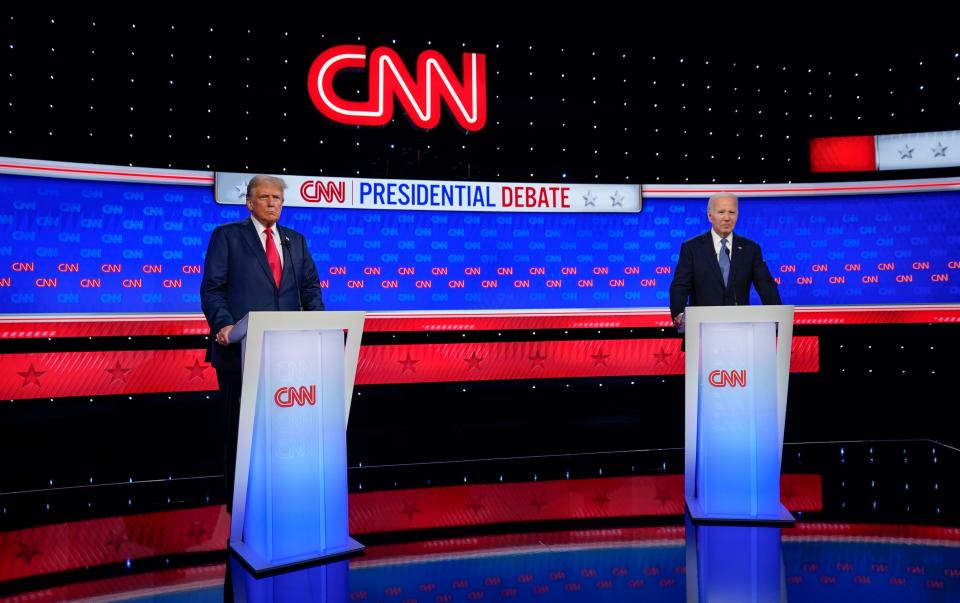 President Joe Biden and former President Donald Trump during the debate at CNN's studios in Atlanta on June 27, 2024. CNN Anchors Jake Tapper and Dana Bash are moderators of the debate.