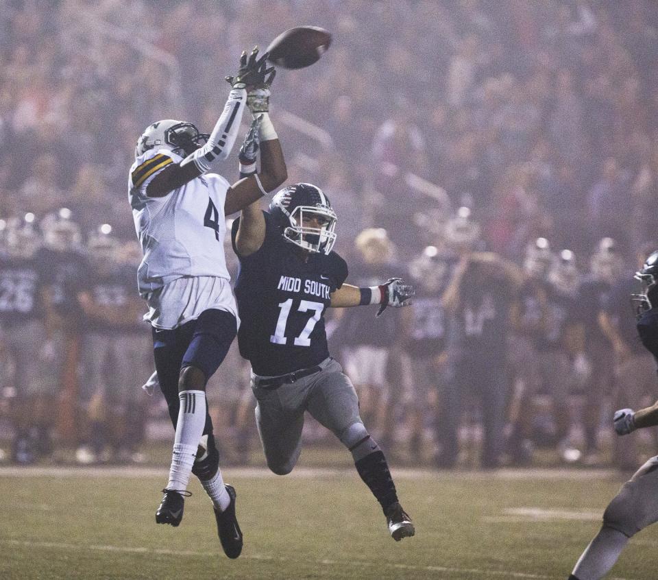 Toms River North's Darrion Carrington catches a long pass near the end zone during the closing minute of the first half at Middletown South in 2016.