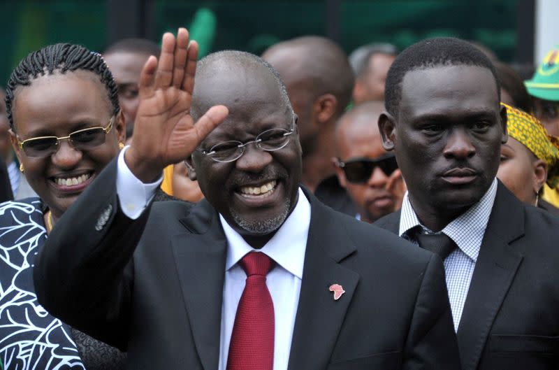 FILE PHOTO: FILE PHOTO: Tanzania's President elect Magufuli salutes members of the ruling CCM at the party's sub-head office on Lumumba road in Dar es Salaam