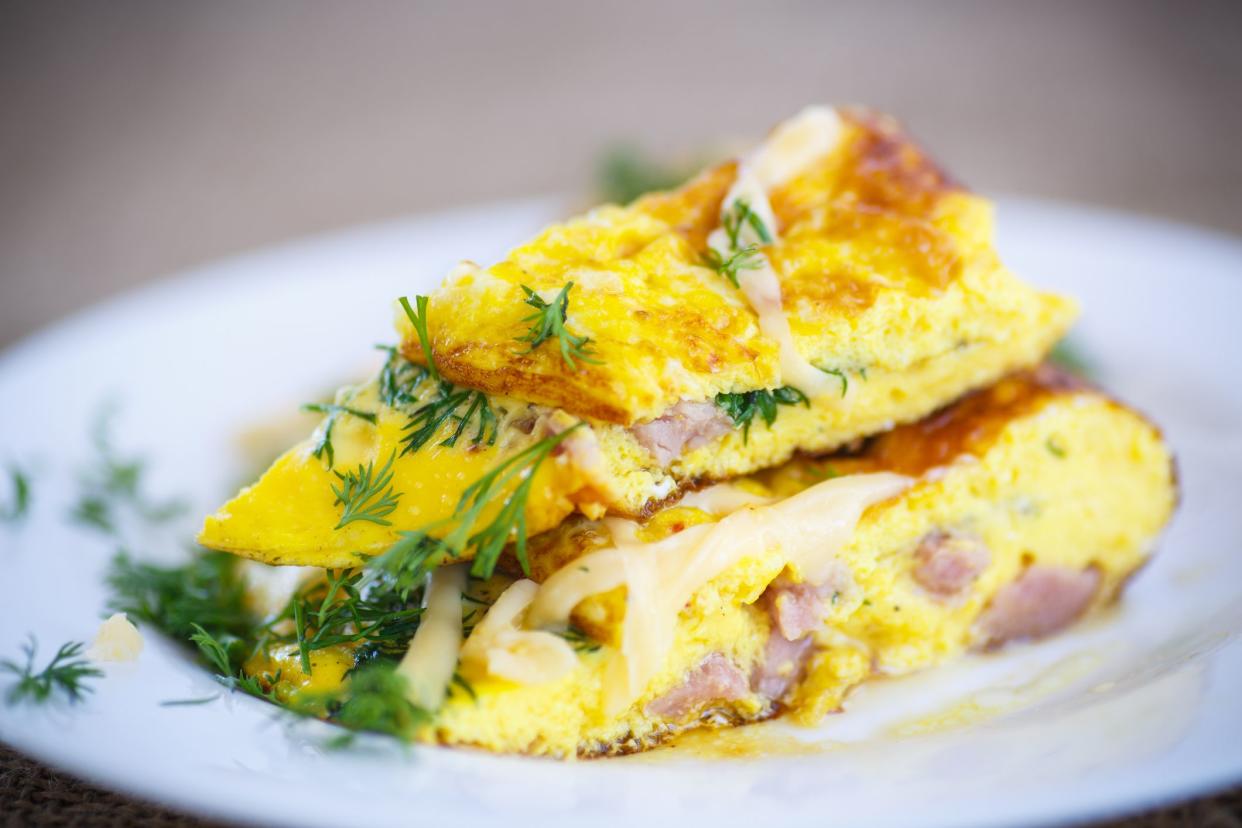 scrambled eggs with fresh herbs on the table