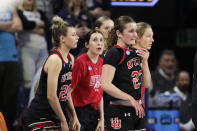 Utah players walk to a timeout late in a second-round college basketball game against Gonzaga in the NCAA Tournament in Spokane, Wash., Monday, March 25, 2024. (AP Photo/Young Kwak)