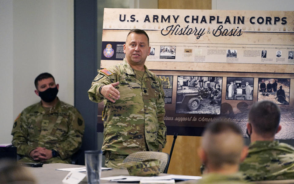 Buddy Winn, the Minnesota State Chaplain and a Pentecostal pastor addresses Minnesota National Guard chaplains at the armory. Monday, Oct. 19, 2020, in St. Paul, Minn. Since the first chaplains were put on paid Army positions in 1775, the fundamental objective has remained the same – to provide pastoral care to their assigned units, everything from leading worship to counseling even for those who are not religious, although proximately 65% of Minnesota National Guard members are, said Winn. (AP Photo/Jim Mone)