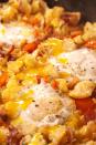 <p>The sky's the limit when you have frozen cauliflower in your freezer. <a href="https://www.delish.com/cooking/recipe-ideas/recipes/a47565/cauliflower-crust-pizza-recipe/" rel="nofollow noopener" target="_blank" data-ylk="slk:Cauliflower Pizza Crust;elm:context_link;itc:0;sec:content-canvas" class="link ">Cauliflower Pizza Crust</a> and <a href="https://www.delish.com/cooking/recipe-ideas/recipes/a48476/cauliflower-tots-recipe/" rel="nofollow noopener" target="_blank" data-ylk="slk:Cauliflower Tots;elm:context_link;itc:0;sec:content-canvas" class="link ">Cauliflower Tots</a> are insanely delicious, for example. But when you're hungry and want something a little easier, make this hash. </p><p>Get the recipe from <a href="https://www.delish.com/cooking/recipe-ideas/recipes/a55631/low-carb-breakfast-hash-recipe/" rel="nofollow noopener" target="_blank" data-ylk="slk:Delish;elm:context_link;itc:0;sec:content-canvas" class="link ">Delish</a>.</p>