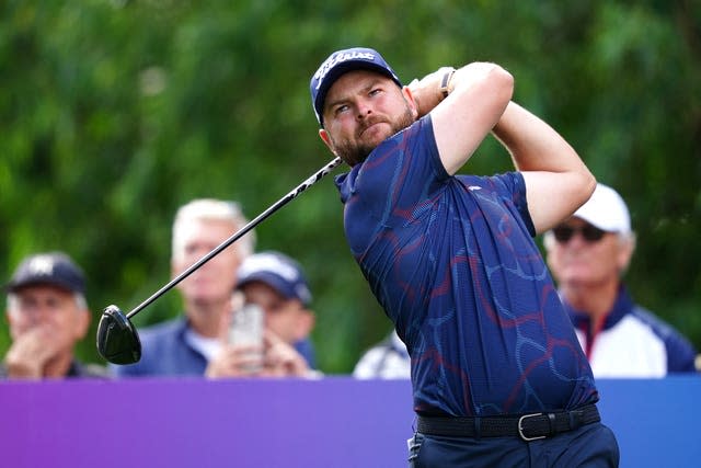 Jordan Smith watches his tee shot