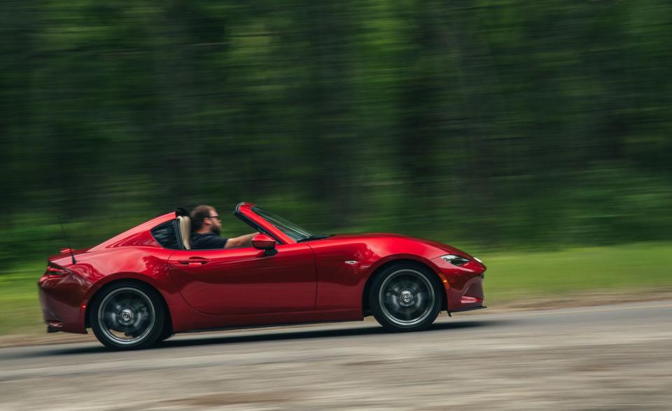 <p>The Miata RF's coupe-like roofline is fetching, and the setup is slightly quieter than the softtop roadster's, but lowering the targa roof panel results in a swirl of turbulent air in the cabin at speed.</p>