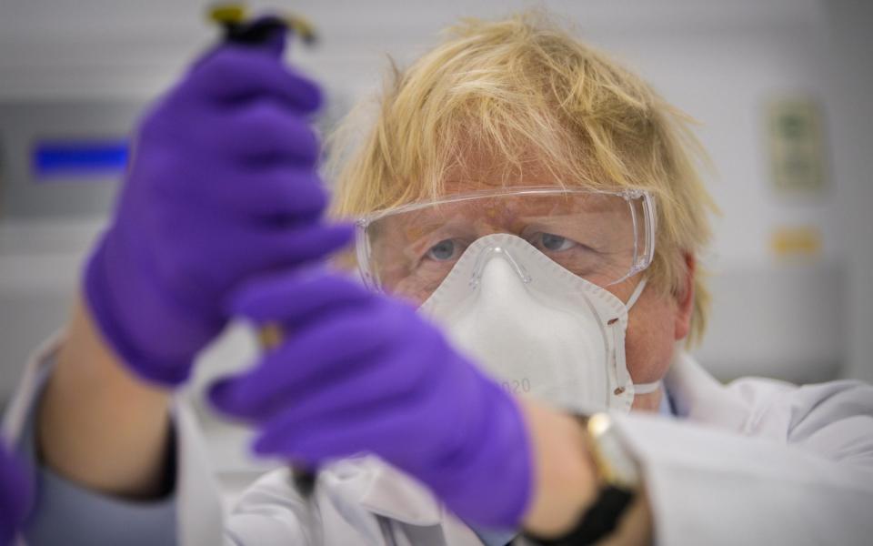 Prime Minister Boris Johnson during his visit to the French biotechnology laboratory Valneva in Livingston - Wattie Cheung