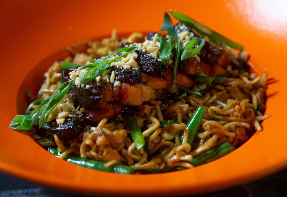 Stretched noodles with Char Siu pork, scallions, bean sprouts, bamboo shoots, Koji, garlic, chives, long bean and peanuts at Bad Hat Dumplings & Cocktails in Marlboro.