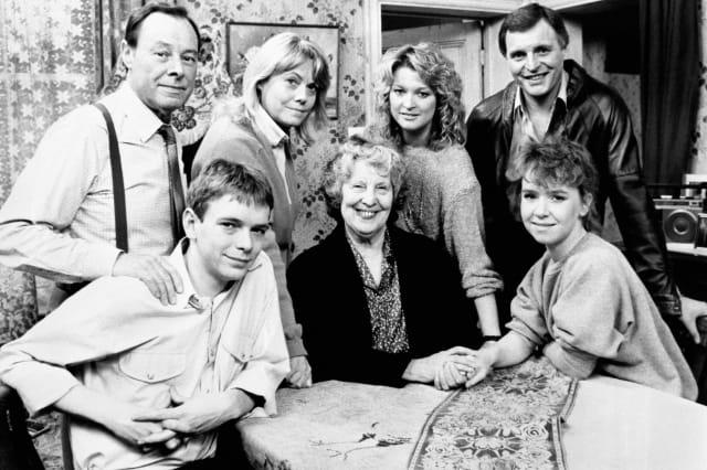 A 'Family Album' gathering to mark the passing of Lou Beale, matriarch of Albert Square and Britain's favourite television granny, who "has died peacefully in her sleep" so that actress Anna Wing couldwithdraw from the cast of the BBC-1 top-rated serial to work on other projects.Lou is seated with Ian (Adam Woodyatt) and Michelle (Susan Tully).Standing are, from left: Arthur (played by Bill Treacher); Pauline (played by Wendy Richard), Kathy (played by Gillian Taylforth) and Pete (played by Peter Dean)