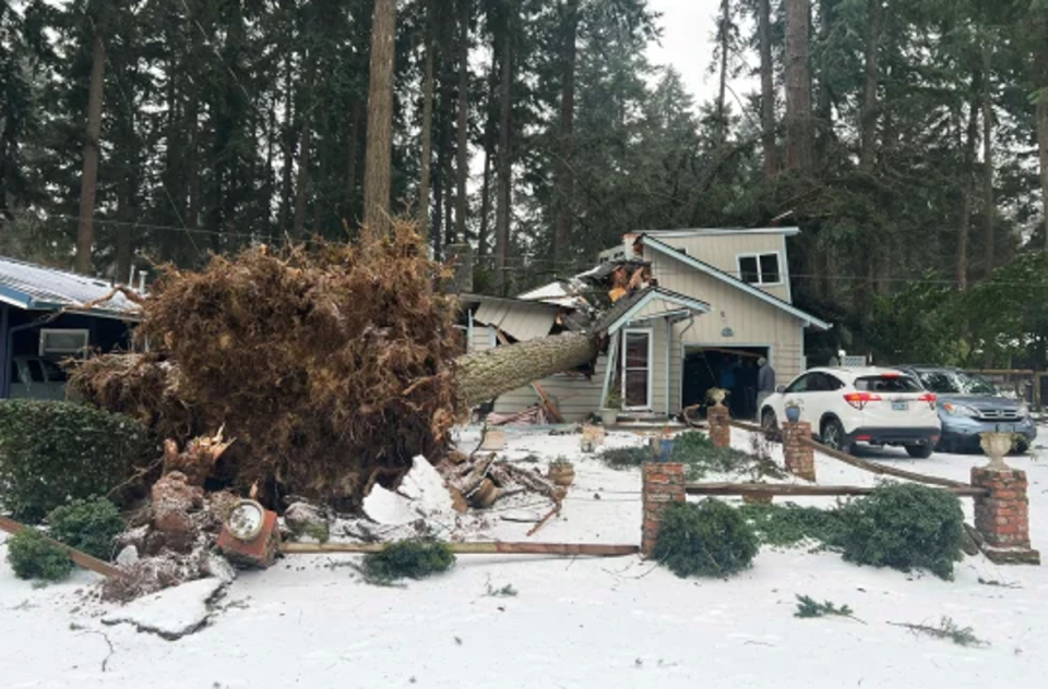 A severely damaged house after a tree fell due to severe weather in Lake Oswego, Oregon (Lake Oswego Fire Department)