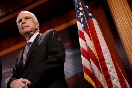 FILE PHOTO - Senator John McCain (R-AZ) looks on during a press conference about his resistance to the so-called "Skinny Repeal" of the Affordable Care Act on Capitol Hill in Washington, U.S., July 27, 2017. REUTERS/Aaron P. Bernstein/File Photo