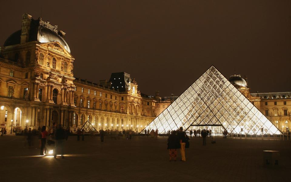 PARIS - AUGUST 24:  The Pyramide of the Louvre museum designed by I.M. Pei is seen on August 24, 2005 in Paris, France. Dan Brown is the author of numerous  bestsellers, including Digital Fortress, Angels and Demons, and Deception Point. His acclaimed novel "The Da Vinci Code"has become one of the most widely read books of all time.  (Photo by Pascal Le Segretain/Getty Images)