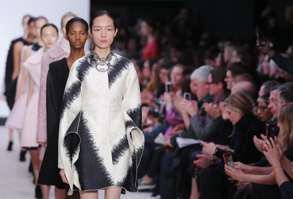 Models wear creations for Giambattista Valli's ready-to-wear fall/winter 2014-2015 fashion collection presented in Paris, Monday, March 3, 2014. (AP Photo/Jacques Brinon)