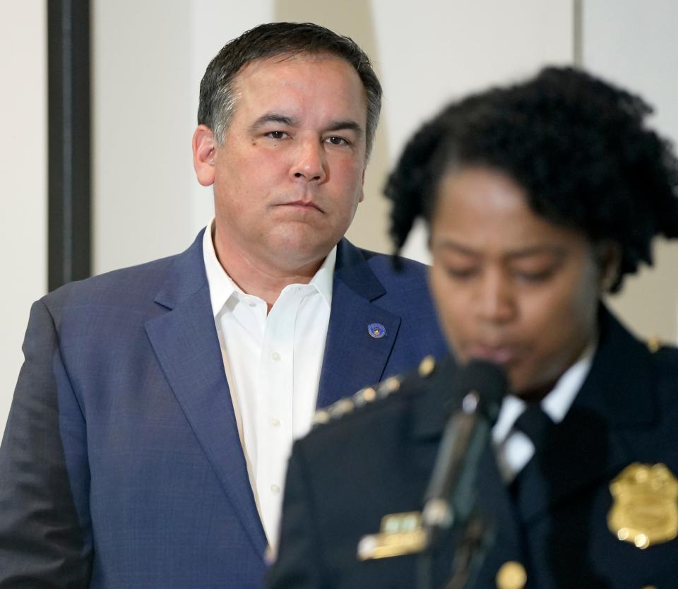 April 28, 2023; Columbus, Ohio, USA;  
Mayor Andrew Ginther stands behind the lecturn as Columbus Police Chief Elaine Bryant discusses recent incidents of gun violence involving children during a press conference at the Columbus Police Academy on Friday.
Mandatory Credit: Barbara J. Perenic/Columbus Dispatch