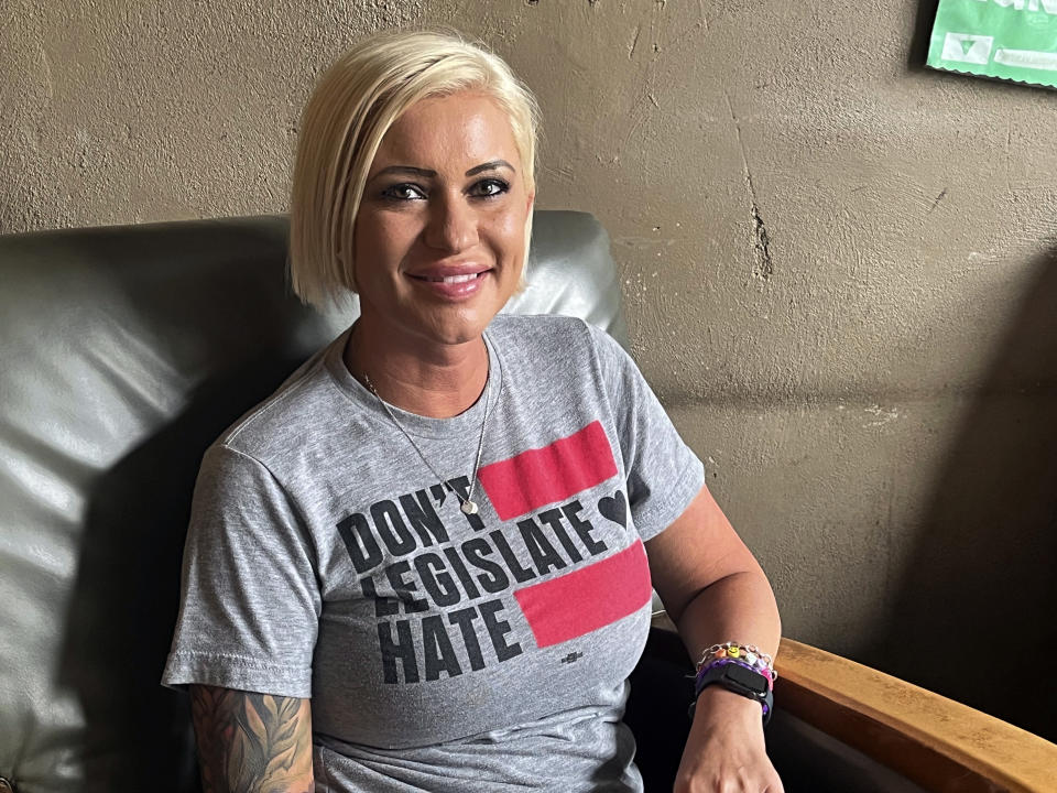 Jamie Bonkiewicz, of Omaha, Neb., sits in a downtown Omaha coffee shop, Friday, June 9, 2023, where she discussed watching hours of debate by Nebraska lawmakers during the 90-day session that ended June 1. She was one of many viewers who tuned in as conservatives pushed a bill to restrict gender-affirming care for transgender children and progressives fought back by staging an epic filibuster. (AP Photo/Margery Beck)