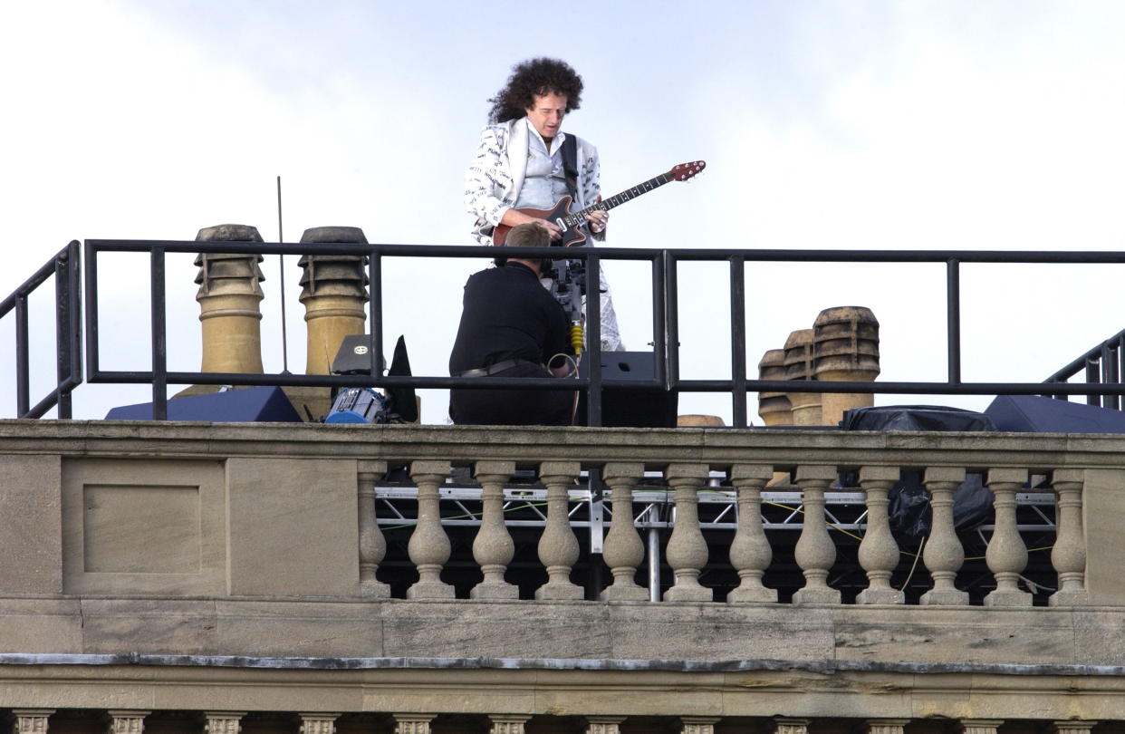 LONDON, UNITED KINGDOM - JUNE 02:  The National Anthem Played By Guitarist Brian May From The Roof Of The Palace During 