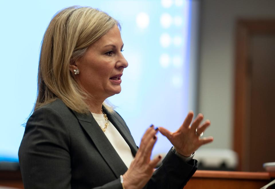 Oakland County Prosecutor Karen McDonald questions witness Oxford High School counselor Shawn Hopkins as Jennifer Crumbley and James Crumbley, parents of Ethan Crumbley, who is accused of the deadly school shooting at Oxford High School in late November, sit in the courtroom of Judge Julie Nicholson in 52/3 District Court in Rochester Hills on Feb.24, 2022. The couple is facing involuntary manslaughter charges for allegedly buying the gun that the police say their son used in the shooting that killed four students and injured six other students and a teacher.