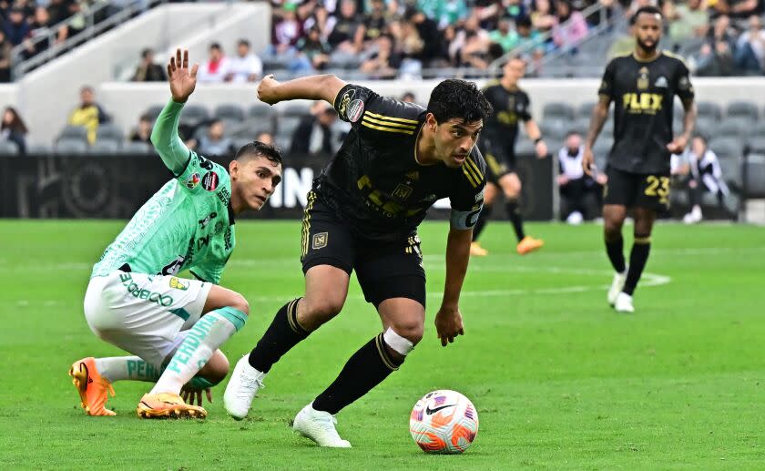 LAFC's Spanish-Mexican forward Carlos Vela vies for the ball with Leon's Mexican midfielder Fidel Ambriz.