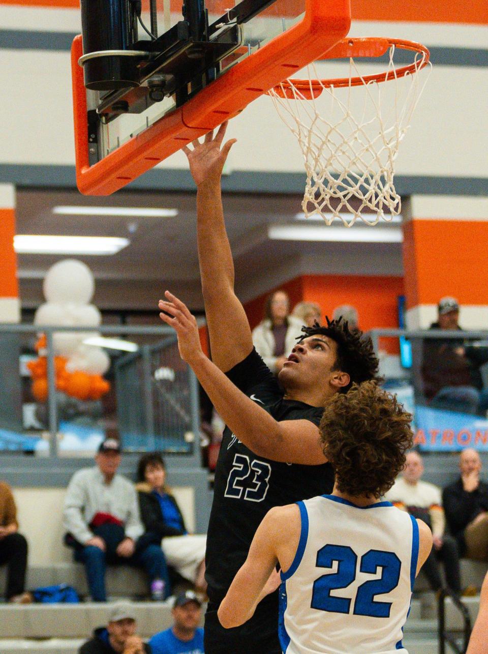 Herriman High School’s Malcolm Johnson shoots a basket during a boys basketball semifinal game against Dixie High School in the Allstate Falcon Classic at Skyridge High School in Lehi on Friday, Dec. 8, 2023. | Megan Nielsen, Deseret News