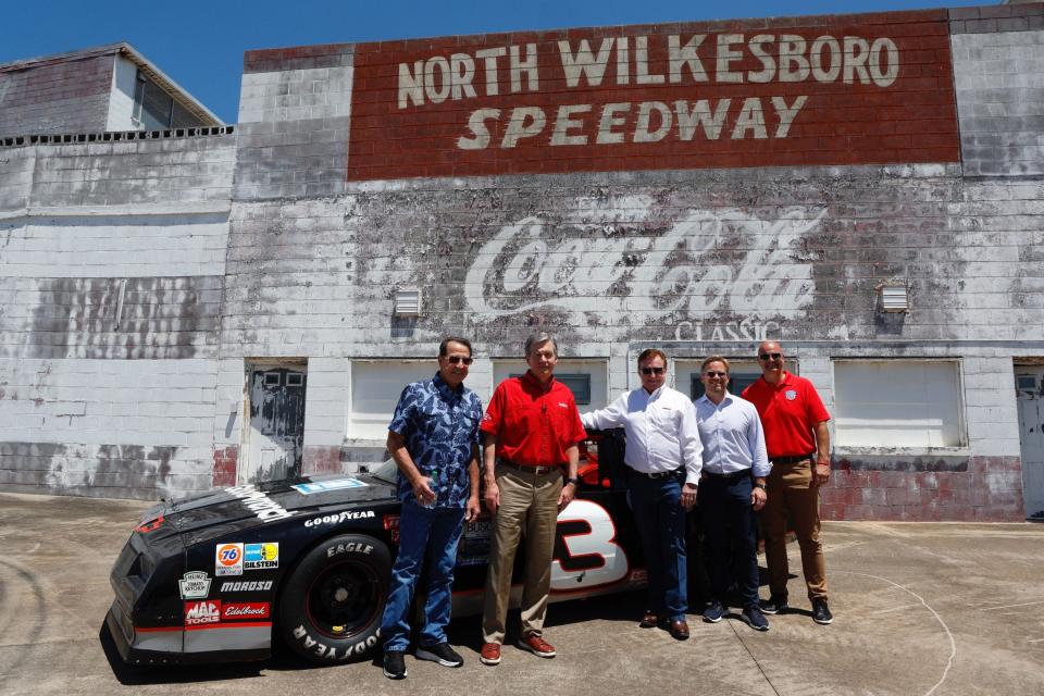 Gov. Roy Cooper (second from right) toured North Wilkesboro Speedway on Tuesday, May 17, 2022, and shared the importance of motorsports to the state’s economy, jobs and tourism. He was joined by (from left) NASCAR legend Harry Gant, NASCAR Hall of Fame team owner Richard Childress, Speedway Motorsports President and CEO Marcus Smith and North Wilkesboro Speedway Executive Director Graig Hoffman.