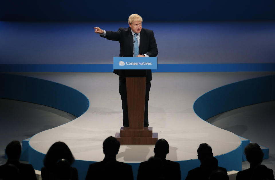 Britain's Prime Minister Boris Johnson delivers his Leader's speech at the Conservative Party Conference in Manchester, England, Wednesday, Oct. 2, 2019. Britain's ruling Conservative Party is holding their annual party conference. (AP Photo/Frank Augstein)