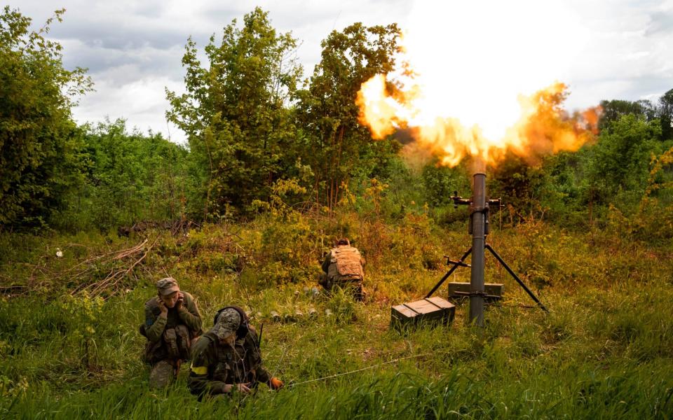 Ukrainian servicemen fire mortars towards Russian positions in east Kharkiv region -  Bernat Armangue/AP