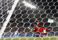 Japan's goalkeeper Eiji Kawashima tries to save a missed goal during their 2014 World Cup Group C soccer match against Greece at the Dunas arena in Natal June 19, 2014. REUTERS/Toru Hanai