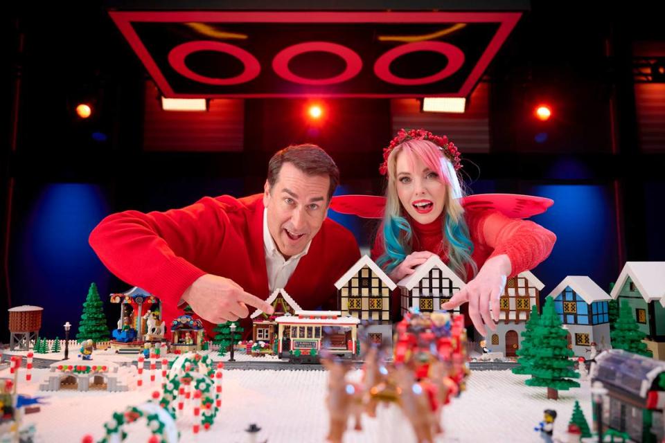 Rob Riggle and Lego expert Krystle Starr show off a Lego creation on “Lego Masters: Celebrity Holiday Bricktacular.”