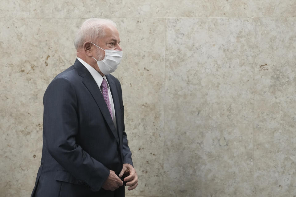 Brazil's President Luiz Inacio Lula da Silva wears a mask, following medical directives to avoid the possibility of contracting a respiratory illness before his scheduled medical procedure, after a ceremony in the Supreme Court, in Brasilia, Brazil, Thursday, Sept. 28, 2023. Lula is expected to undergo hip replacement surgery tomorrow morning at the Sirio-Libanes hospital in Brasilia. (AP Photo/Eraldo Peres)