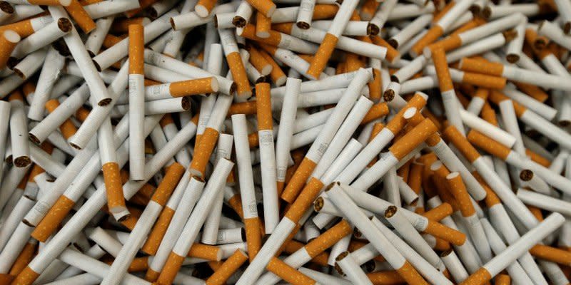 Cigarettes are seen during the manufacturing process in the British American Tobacco Cigarette Factory (BAT) in Bayreuth, southern Germany, April 30, 2014.  REUTERS/Michaela Rehle